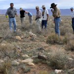 ARCHAEOLOGISTS SURVEY THE GROUND ON THE KANE RANCH ON THE ARIZONA STRIP