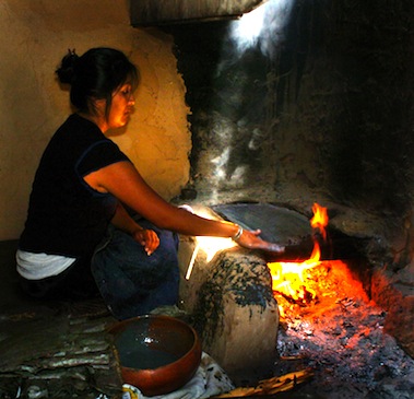 HOPI WOMEN have been making the ceremonial PIKI Bread for centuries in a special cooking space behind the main house