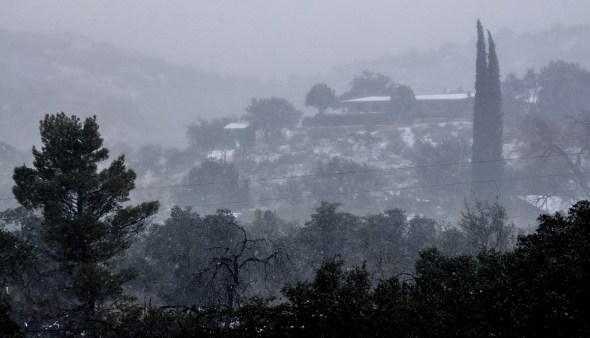 CATALINA HIGHWAY THROUGH ORACLE ROAD IN SNOW FLURRIES