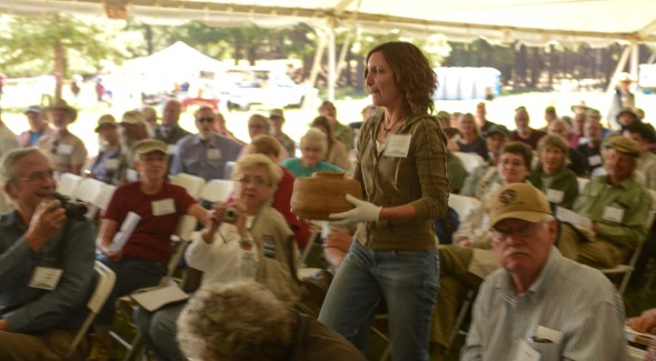 The Pecos Conference attendees are growing older and the conference is hoping to make itself relevent to students and younger archaeologist and anthropologist. Here Gwen Gallenstein shares a woven basket with the conference attendees in hopes of finding a date for the basket.