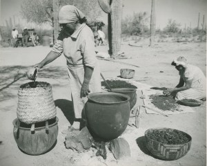 Papago cooks work over baskets and ollas for cooking 1930's. Today the Papago Tribe is known as the Tohono Oodham or Desert People. 