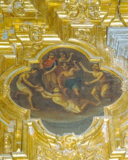 A scene that resembles priests beating Indians