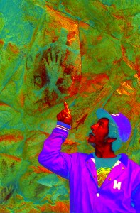 Filtered photograph of Lizard now only shows a hand print which was made by an artist filling his mouth with paint and blowing it through a reed toward his hand on the rock.
